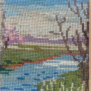 framed petit point embroidered scene 