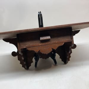 carved turn of the century shelf with drawer 