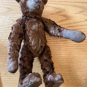 Vintage brown teddy bear with long arms