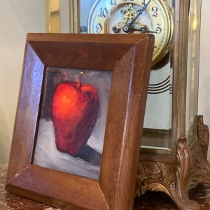 Framed oil painting of an apple 