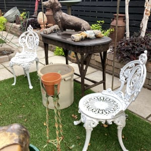 Pair of cast iron garden chairs 