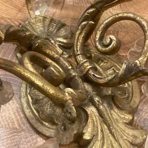 Pair of brass and prism sconces 