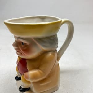 Mini figural pottery pitcher 