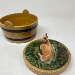 Majolica cow covered butter dish 