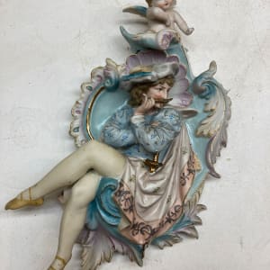 hand painted ornate porcelain figural plaque with cherub 