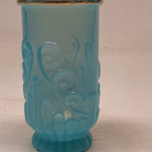 turn of the century blue water glass with molded flowers 