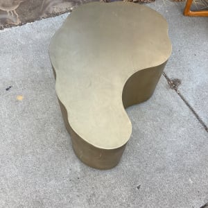 brass colored metal modern table 