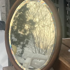 turn of the century oval mirror 