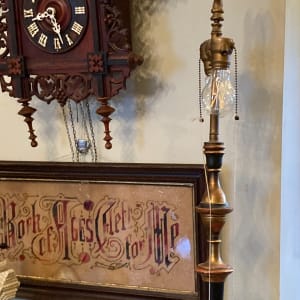 1930's wooden floor lamp with iron base 