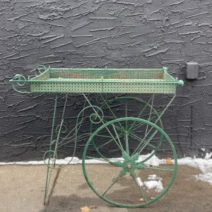 green metal garden cart 
