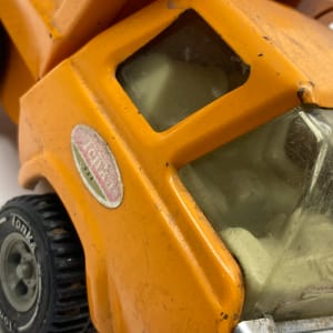 vintage TONKA orange dump truck 