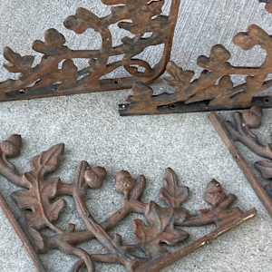 Turn of the century cast iron oak leaf brackets 