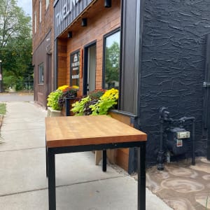 Butcher block table with metal base 