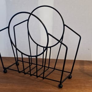 Post modern iron magazine rack 