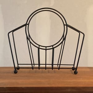 Post modern iron magazine rack 