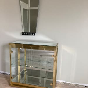 Brass and mirrored low cabinet 