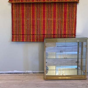 Brass and mirrored low cabinet 