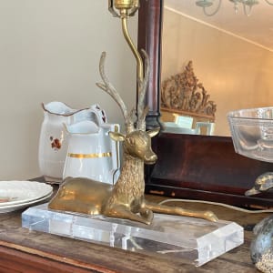 Brass Deer table lamp on lucite base 