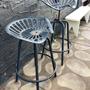 Pair of outdoor tractor seat stools 
