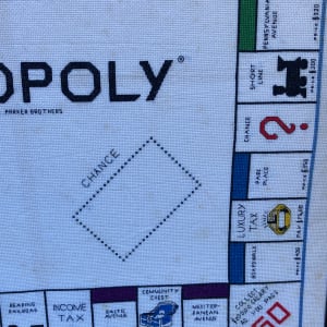 Framed Monopoly crossed stitch and embroidered game board 