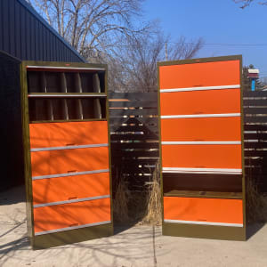 large orange and green metal filing cabinet 