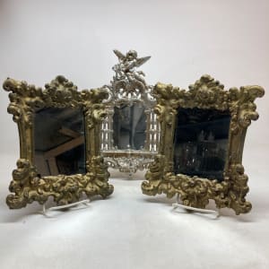 Ornate Victorian iron mirror 