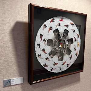 Wind Cave by Jim Yellow Hawk  Image: “I portray traditional symbols — the eagle, the buffalo, and the circle — for which I hold strong beliefs. Many compositions are circular and evocative of the star knowledge in night sky scenes. Wind Cave is where the Lakota People emerged. It is the birthplace of the Buffalo and of the first breath of life. Wind Cave, Tate Wakan, ‘Holy Wind,’ Wasun Niye, ‘The Breathing Hole,’ reminds us with each breath in and out that we are Spiritual beings who must care for all our relations.”