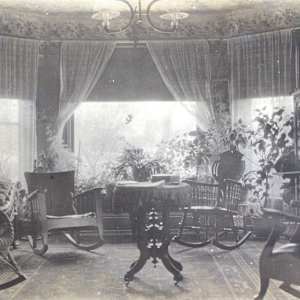 Household Photographs (Set of Five) by Stanley Embree  Image: "South end of living room."
Later note: "Interior photos, early 1900s, by Stan Embree, Lyons, Kan. His mother, Ency Morse Embree, was the daughter of Rev. Milton Morse, older half-brother of Rev. George Morse (my grandfather). Milton established the first Methodist church in state of Kansas."