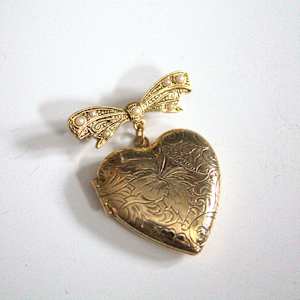 Locket Brooch by 1928, Image 1.