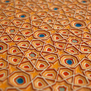untitled layered orange-brown-gold papercut by Ruth Becker 
