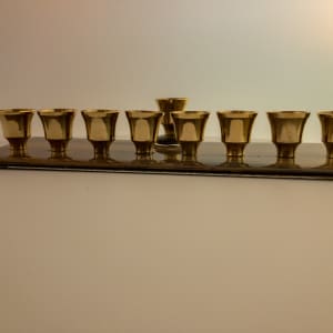 Menorah- wide cup by Shayna Heller 