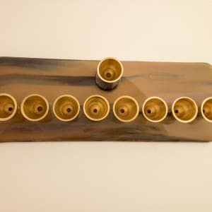 Menorah- wide cup by Shayna Heller 