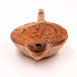 Roman oil lamp by Unknown 