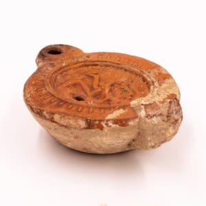 Roman oil lamp by Unknown 