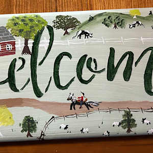 The Cows Are Grazing Near The Hill by Lee Gray