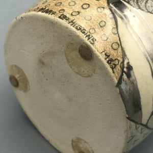 Brush Holder with Four Faces by Mary Lou Higgins 