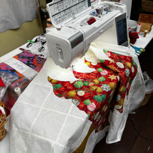 Under the Christmas Tree by O.V. Brantley  Image: Under the Christmas Tree On the sewing machine