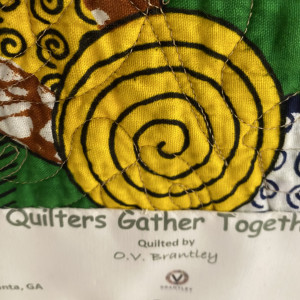 Quilters Gather Together by O.V. Brantley  Image: LAbel