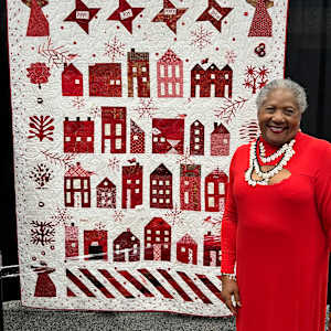 Winter Wonderland Wanderlust by O.V. Brantley  Image: Winter Wonderland Wanderlust and ME at Internatinal Quilt Festival