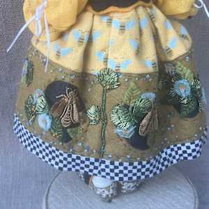 A Bee In Her Bonnet by Christine Shively Benjamin  Image: Close up of the skirt back