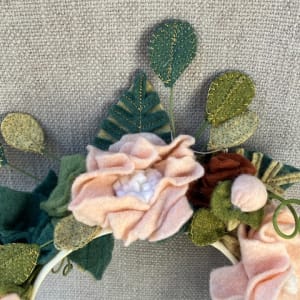 Pale Peach and Teal Felt Flower Headband by Christine Shively Benjamin  Image: Close up of the wool blended felt flowers
