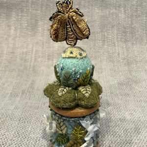 Blue felt vintage spool by Christine Shively Benjamin  Image: Full back view