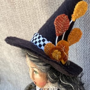 Things That Go Bump In The Night by Christine Shively Benjamin  Image: Side view of hair and hat