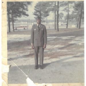 U.S. Army Uniform Cap by Bernard Cap Co., Inc.  Image: Photograph of Earnest Gregory Jr. standing in his U.S. Army uniform, circa 1968-1971 