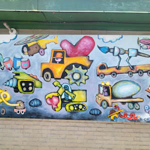 2025 Mural Slam by Jess Clark, Paige Doyle-Elwell, Sarah Egan, Naijah Garrett, Howie Green, Colomba Klenner, Caoin O'Durgy, Bruce Orr, Daphne Powers, Max Pro, Bobbie Smith, Jennifer Wackerle  Image: Construction Time Again by Bruce Orr