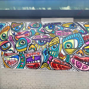 2025 Mural Slam by Jess Clark, Paige Doyle-Elwell, Sarah Egan, Naijah Garrett, Howie Green, Colomba Klenner, Caoin O'Durgy, Bruce Orr, Daphne Powers, Max Pro, Bobbie Smith, Jennifer Wackerle  Image: Jess Clark