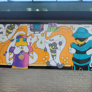 2025 Mural Slam by Jess Clark, Paige Doyle-Elwell, Sarah Egan, Naijah Garrett, Howie Green, Colomba Klenner, Caoin O'Durgy, Bruce Orr, Daphne Powers, Max Pro, Bobbie Smith, Jennifer Wackerle  Image: Bee Boys by Max Pro