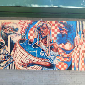 2025 Mural Slam by Jess Clark, Paige Doyle-Elwell, Sarah Egan, Naijah Garrett, Howie Green, Colomba Klenner, Caoin O'Durgy, Bruce Orr, Daphne Powers, Max Pro, Bobbie Smith, Jennifer Wackerle  Image: Basking in Spirit's Flow by Naijah Garrett