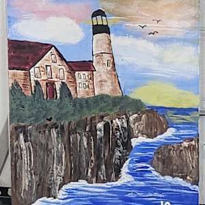 Lighthouse on a Cliff by Larry Alexis the junkart dog