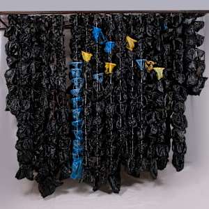 We Trusted, So We Gave You Our Hearts, Gathered in a Bag, and We Waited (About Black and the Bag Wall Series) by Amarachi Okafor (Orie) 